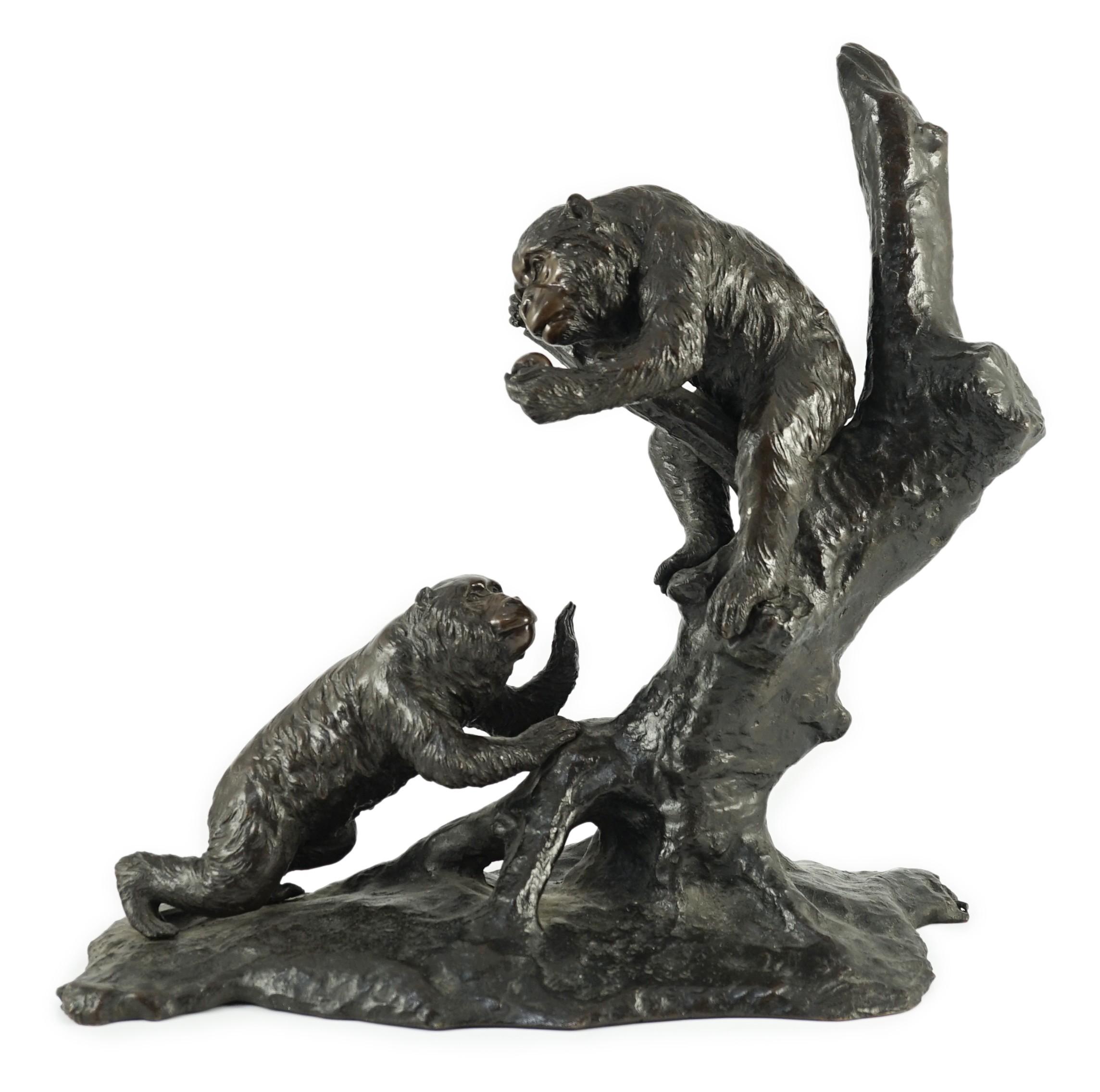 A large Japanese bronze group of two monkeys on a tree, by Genryusai Seiya, Meiji period, 42.5cm high, 43cm wide